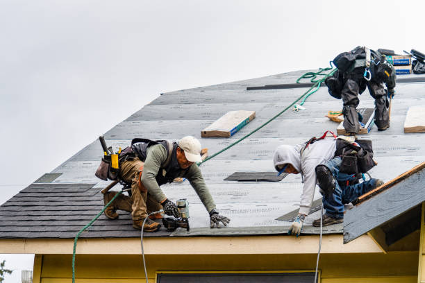 Professional Flat Roof Repair technician working in Newberg, OR